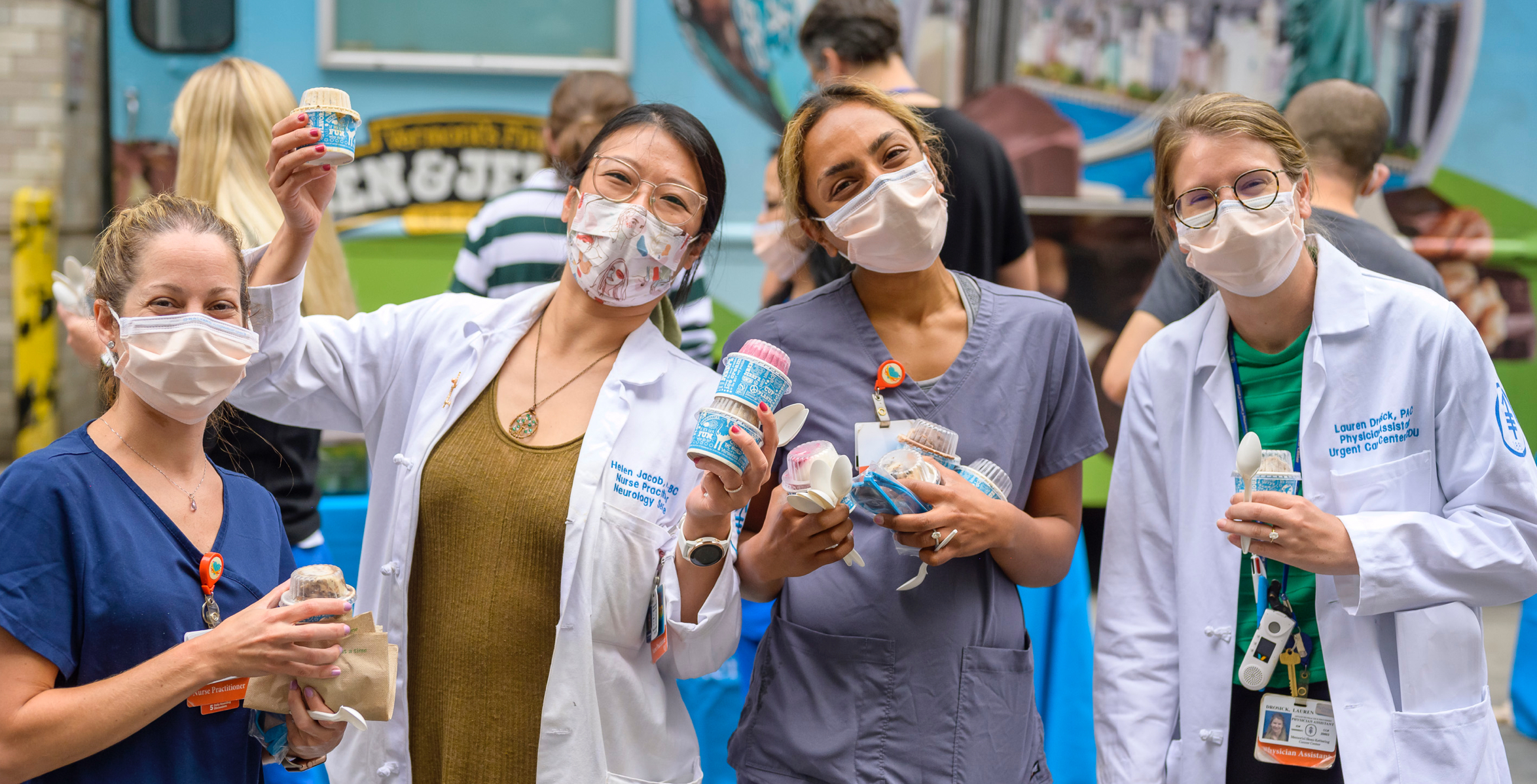 Crowd of medical staff eating ice cream